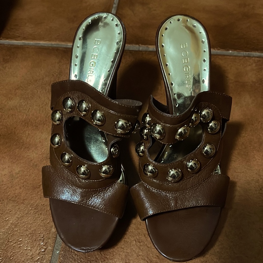 BCBG brown heals with golden studs.